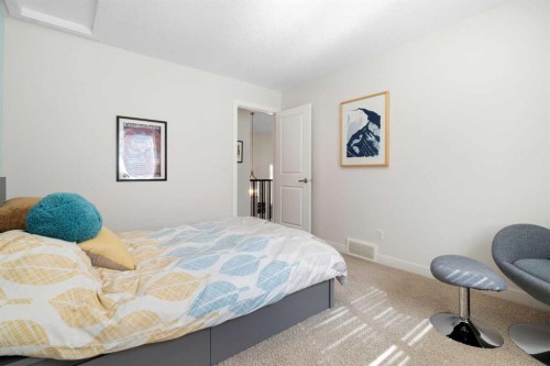 61 Cougar Ridge Cove Sw, Calgary, AB - Indoor Photo Showing Bedroom