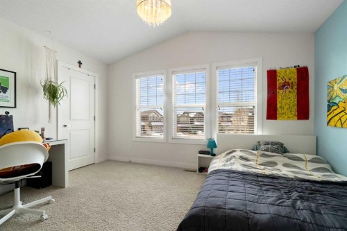 61 Cougar Ridge Cove Sw, Calgary, AB - Indoor Photo Showing Bedroom