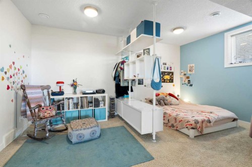 61 Cougar Ridge Cove Sw, Calgary, AB - Indoor Photo Showing Bedroom