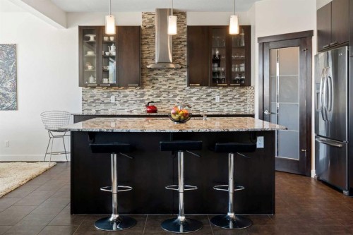 61 Cougar Ridge Cove Sw, Calgary, AB - Indoor Photo Showing Kitchen With Upgraded Kitchen