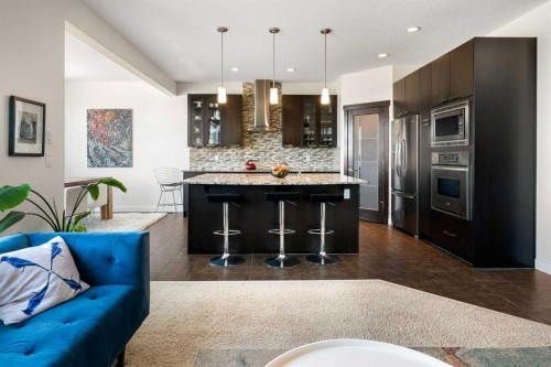 61 Cougar Ridge Cove Sw, Calgary, AB - Indoor Photo Showing Kitchen With Upgraded Kitchen