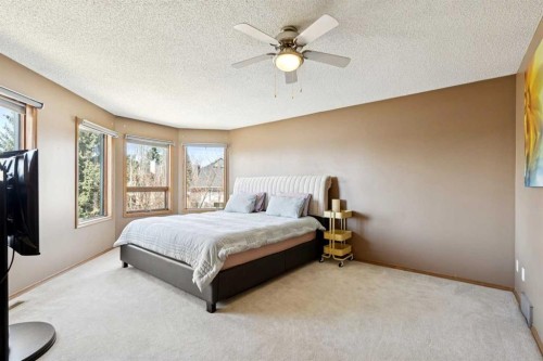 111 Scenic Ridge Court Nw, Calgary, AB - Indoor Photo Showing Bedroom