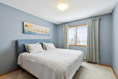 111 Scenic Ridge Court Nw, Calgary, AB - Indoor Photo Showing Bedroom