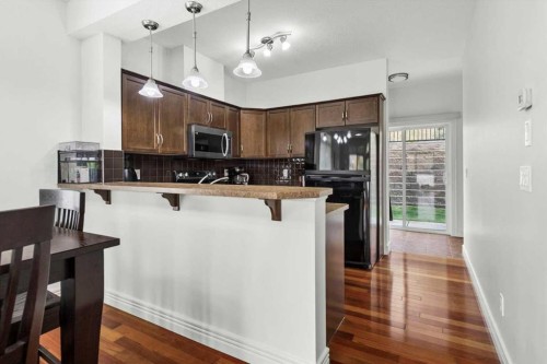 1-164 Rockyledge View Nw, Calgary, AB - Indoor Photo Showing Kitchen