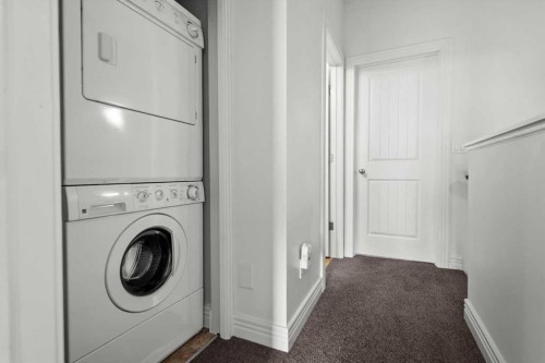 1-164 Rockyledge View Nw, Calgary, AB - Indoor Photo Showing Laundry Room