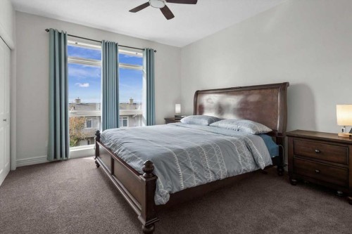1-164 Rockyledge View Nw, Calgary, AB - Indoor Photo Showing Bedroom