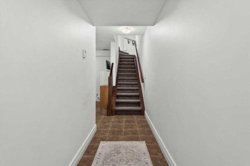 1-164 Rockyledge View Nw, Calgary, AB - Indoor Photo Showing Other Room
