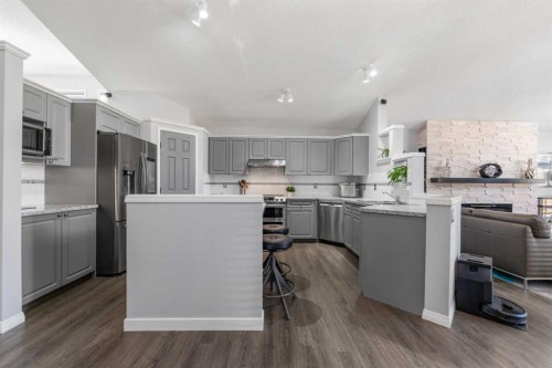 114 Rocky Ridge Green Nw, Calgary, AB - Indoor Photo Showing Kitchen With Upgraded Kitchen