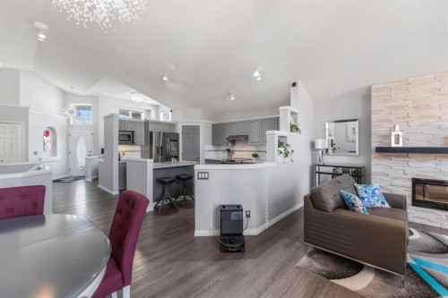 114 Rocky Ridge Green Nw, Calgary, AB - Indoor With Fireplace