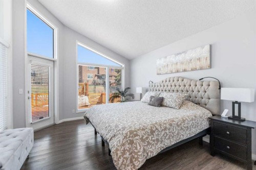 114 Rocky Ridge Green Nw, Calgary, AB - Indoor Photo Showing Bedroom