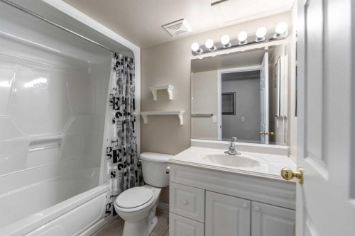 114 Rocky Ridge Green Nw, Calgary, AB - Indoor Photo Showing Bathroom