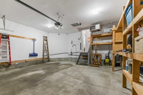 114 Rocky Ridge Green Nw, Calgary, AB - Indoor Photo Showing Garage