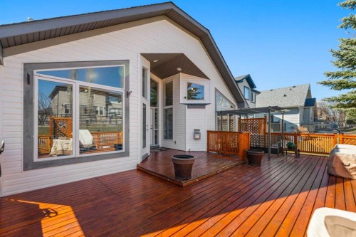 114 Rocky Ridge Green Nw, Calgary, AB - Outdoor With Deck Patio Veranda With Exterior