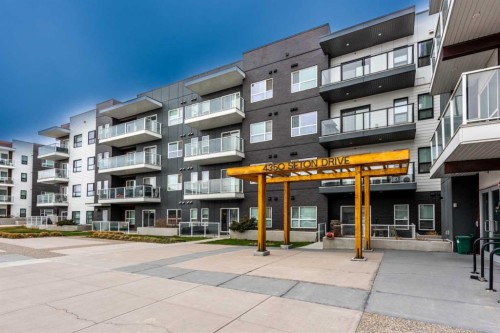 116-4350 Seton Drive Se, Calgary, AB - Outdoor With Balcony With Facade