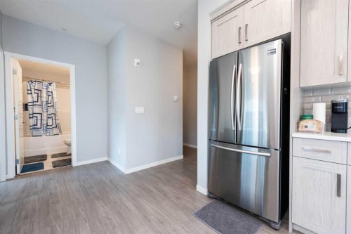 116-4350 Seton Drive Se, Calgary, AB - Indoor Photo Showing Kitchen