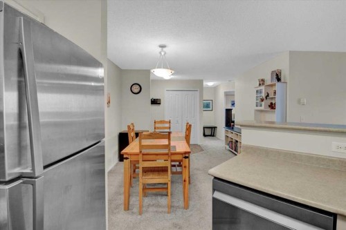 4122-4975 130 Avenue Se, Calgary, AB - Indoor Photo Showing Kitchen