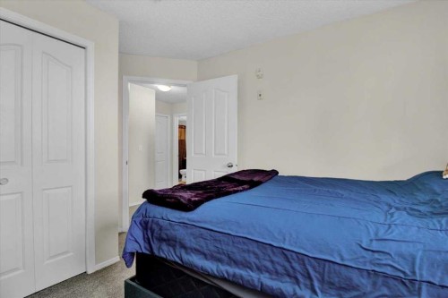 4122-4975 130 Avenue Se, Calgary, AB - Indoor Photo Showing Bedroom