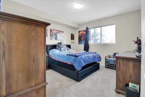 4122-4975 130 Avenue Se, Calgary, AB - Indoor Photo Showing Bedroom