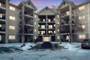 4122-4975 130 Avenue Se, Calgary, AB  - Outdoor With Balcony With Facade 