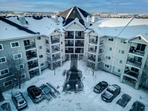 4122-4975 130 Avenue Se, Calgary, AB - Outdoor With Balcony With Facade