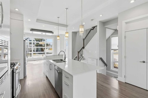 2052 46 Avenue Sw, Calgary, AB - Indoor Photo Showing Kitchen With Double Sink With Upgraded Kitchen