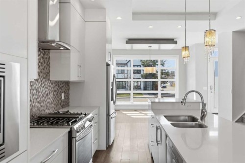 2052 46 Avenue Sw, Calgary, AB - Indoor Photo Showing Kitchen With Double Sink