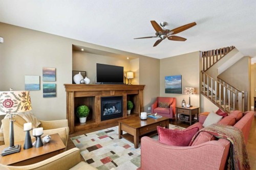 325 Evanspark Circle Nw, Calgary, AB - Indoor Photo Showing Living Room With Fireplace