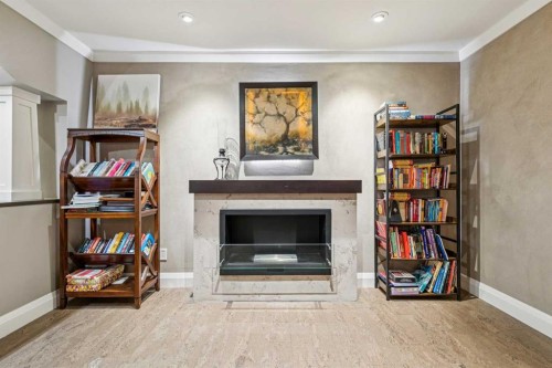 367 Discovery Place Sw, Calgary, AB - Indoor With Fireplace