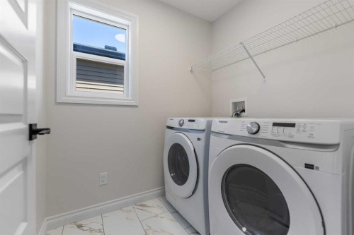 90 Homestead Circle Ne, Calgary, AB - Indoor Photo Showing Laundry Room