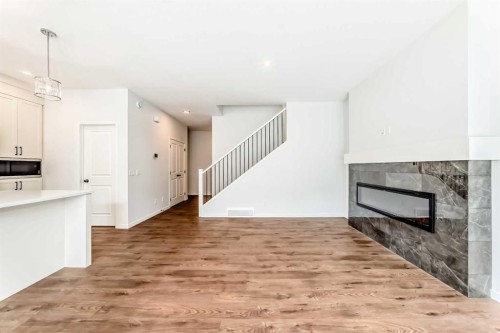 102 Setonstone Manor Se, Calgary, AB - Indoor With Fireplace