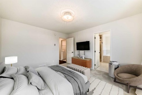 102 Setonstone Manor Se, Calgary, AB - Indoor Photo Showing Bedroom
