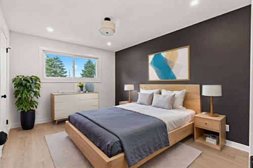 212 Queen Anne Road Se, Calgary, AB - Indoor Photo Showing Bedroom
