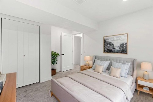 212 Queen Anne Road Se, Calgary, AB - Indoor Photo Showing Bedroom