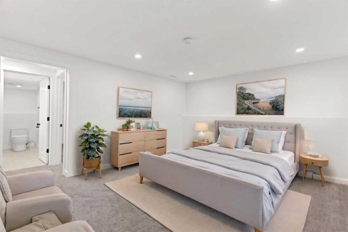 212 Queen Anne Road Se, Calgary, AB - Indoor Photo Showing Bedroom