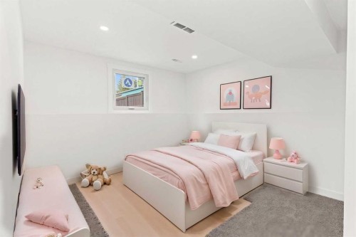 212 Queen Anne Road Se, Calgary, AB - Indoor Photo Showing Bedroom