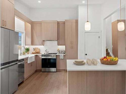 212 Queen Anne Road Se, Calgary, AB - Indoor Photo Showing Kitchen With Upgraded Kitchen