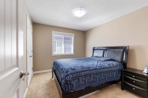 130 Brightonwoods Grove Se, Calgary, AB - Indoor Photo Showing Bedroom