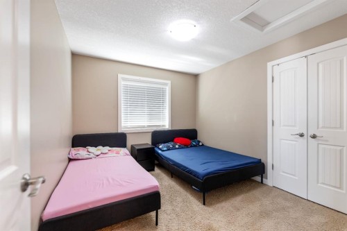130 Brightonwoods Grove Se, Calgary, AB - Indoor Photo Showing Bedroom