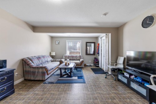 130 Brightonwoods Grove Se, Calgary, AB - Indoor Photo Showing Living Room