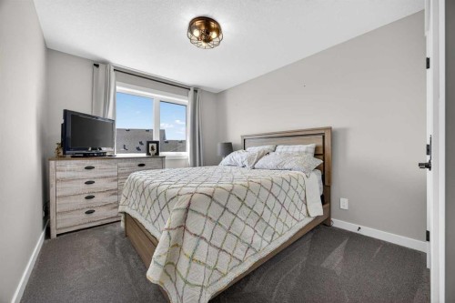 10 Bishop Circle, Carstairs, AB - Indoor Photo Showing Bedroom
