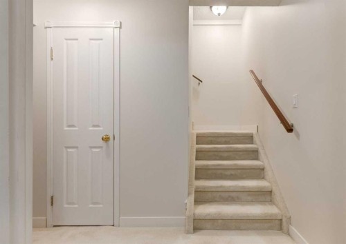 83 Gleneagles Close, Cochrane, AB - Indoor Photo Showing Other Room