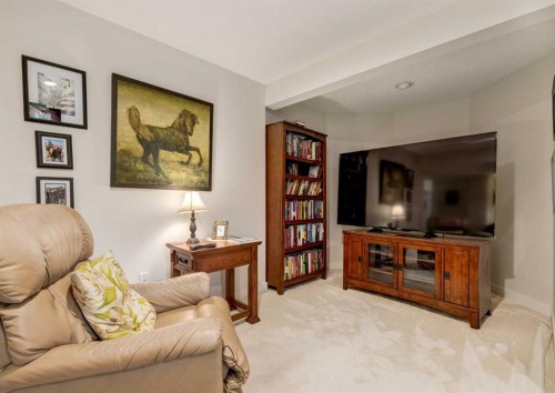 83 Gleneagles Close, Cochrane, AB - Indoor Photo Showing Living Room
