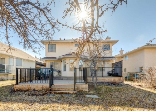 83 Gleneagles Close, Cochrane, AB - Outdoor With Deck Patio Veranda