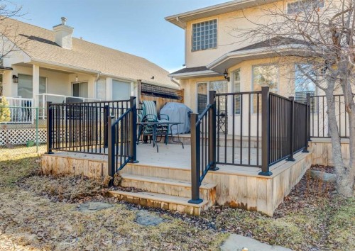 83 Gleneagles Close, Cochrane, AB - Outdoor With Deck Patio Veranda