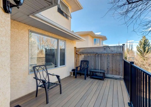83 Gleneagles Close, Cochrane, AB - Outdoor With Deck Patio Veranda With Exterior