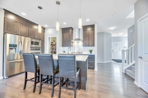 9 Mist Mountain Rise, Okotoks, AB - Indoor Photo Showing Kitchen With Upgraded Kitchen
