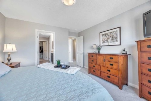 9 Mist Mountain Rise, Okotoks, AB - Indoor Photo Showing Bedroom