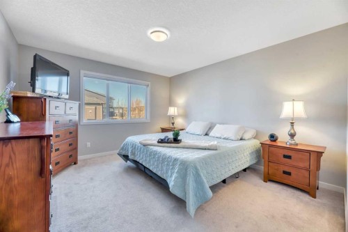 9 Mist Mountain Rise, Okotoks, AB - Indoor Photo Showing Bedroom