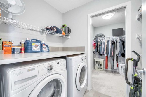 9 Mist Mountain Rise, Okotoks, AB - Indoor Photo Showing Laundry Room