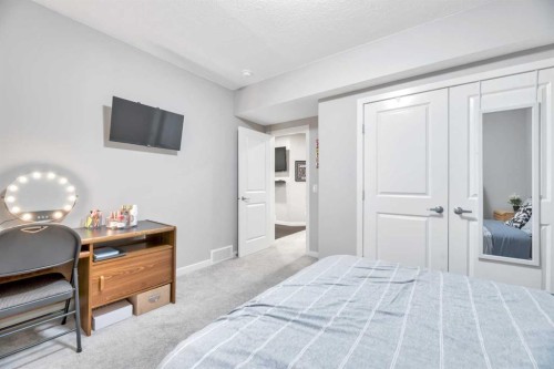 9 Mist Mountain Rise, Okotoks, AB - Indoor Photo Showing Bedroom